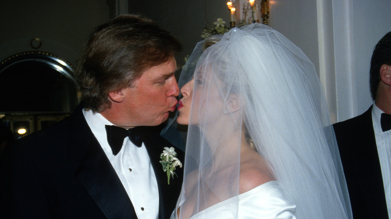 Donald Trump kisses then-wife Marla Maples