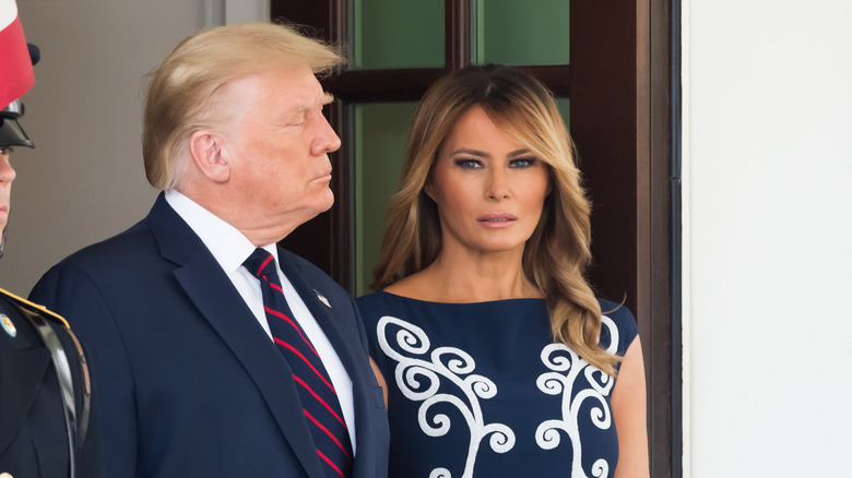 Donald and Melania Trump in front of the White House