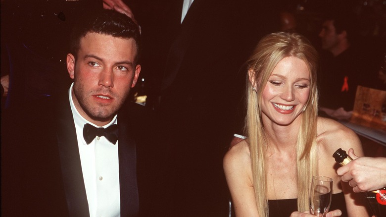 Gwyneth Paltrow smiling beside Ben Affleck