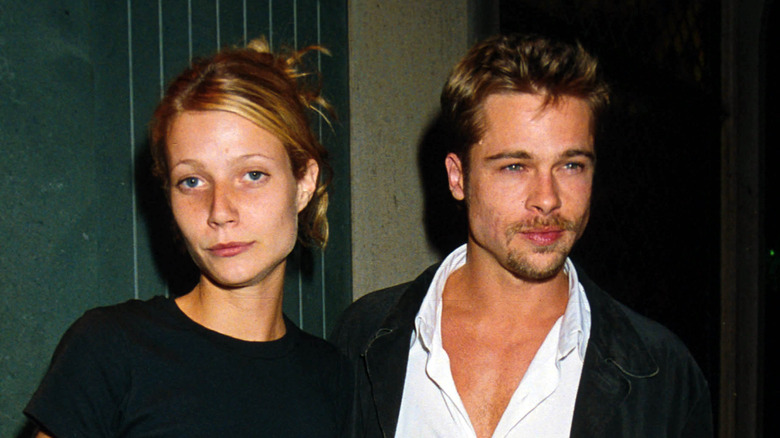 Gwyneth Paltrow posing with Brad Pitt