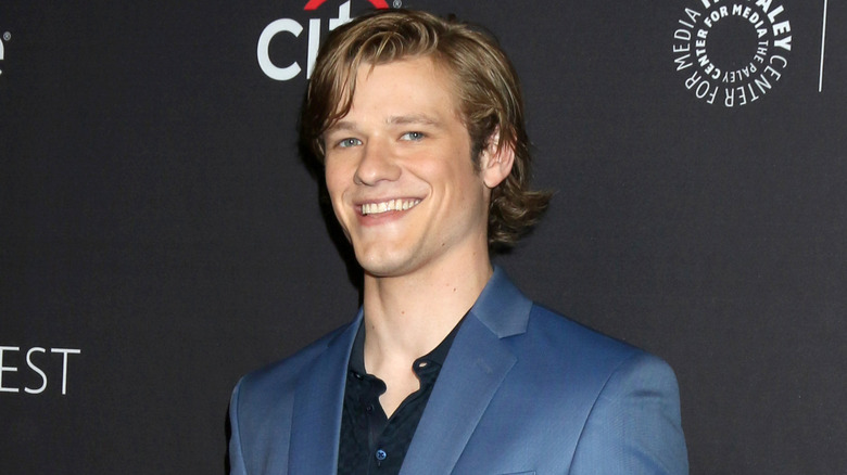 Lucas Till smiling in 2019