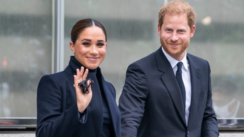 Prince Harry and Meghan Markle smiling