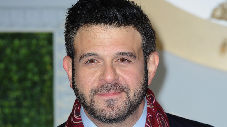 Adam Richman posing in London