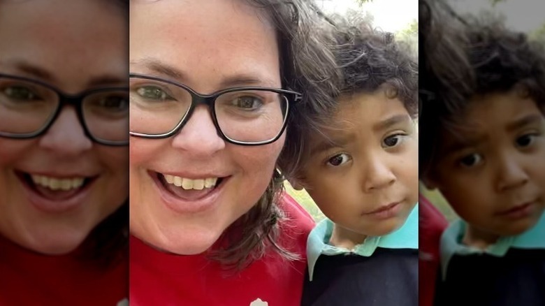 Tracey Bloom and her son posing for a photo