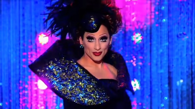 Bianca Del Rio blue glitter dress on the runway