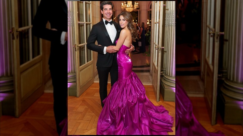 Jesse Watters posing with his current wife Emma Watters