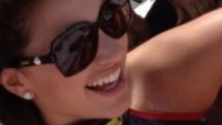 Jacqueline Barkett smiling big sunglasses