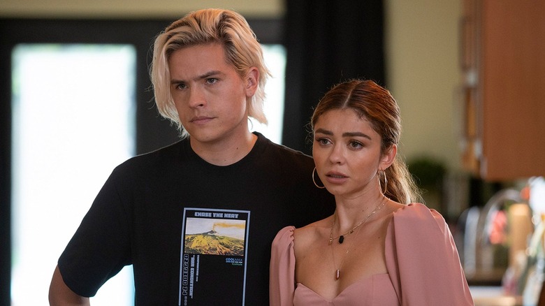 Sarah Hyland and Dylan Sprouse standing together