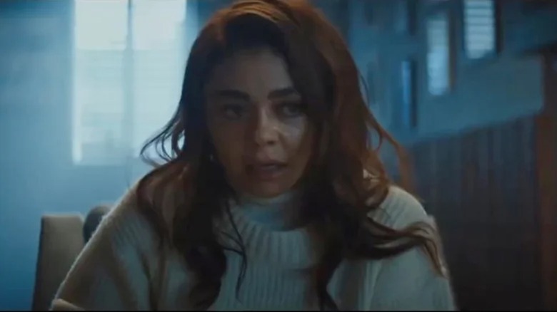 Sarah Hyland wearing white sweater in Taco Bell commercial