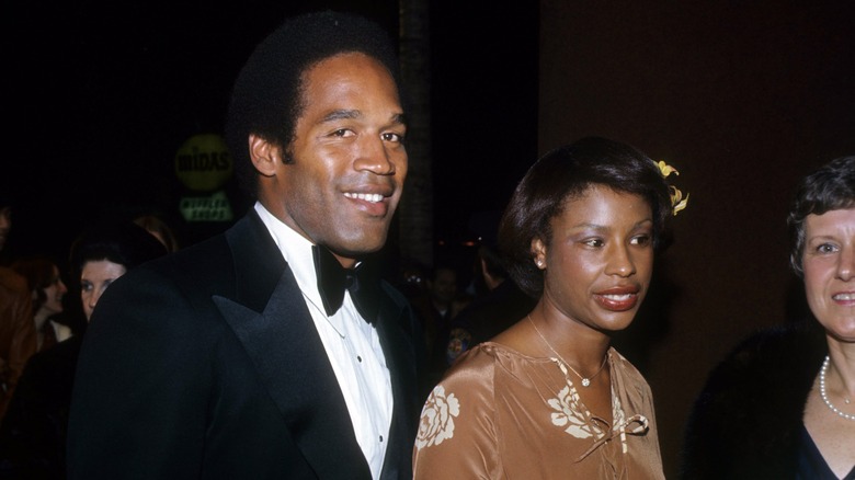 Marguerite Whitley with O.J. Simpson in 1997