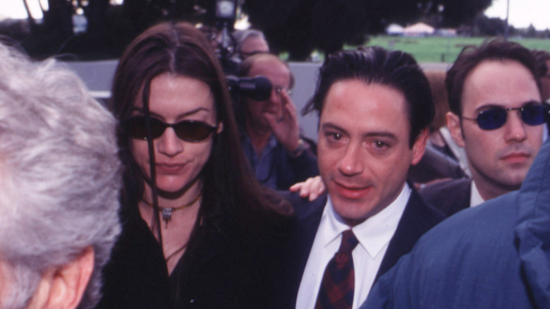 Robert Downey Jr. and Deborah Falconer walking