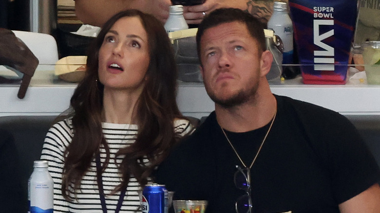 Minka Kelly and Dan Reynolds sitting together