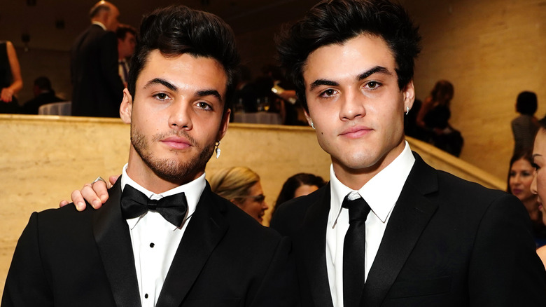 The Dolan twins in suits