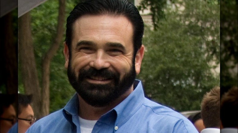 Billy Mays smiling in blue shirt