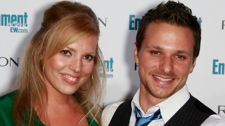 Lea Lachey and Drew Lachey smiling