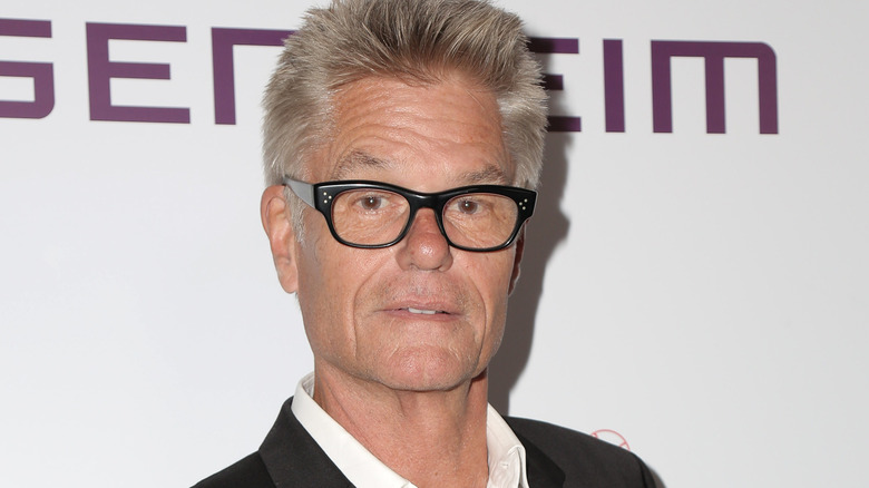 Harry Hamlin in big glasses 