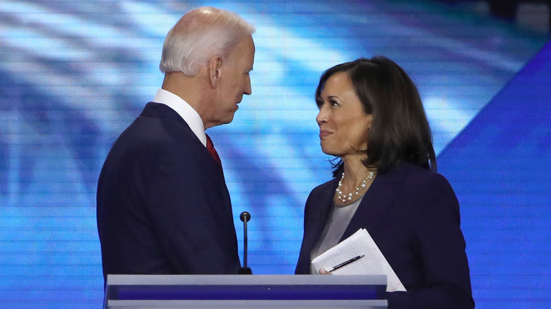 Joe Biden and Kamala Harris look at each other