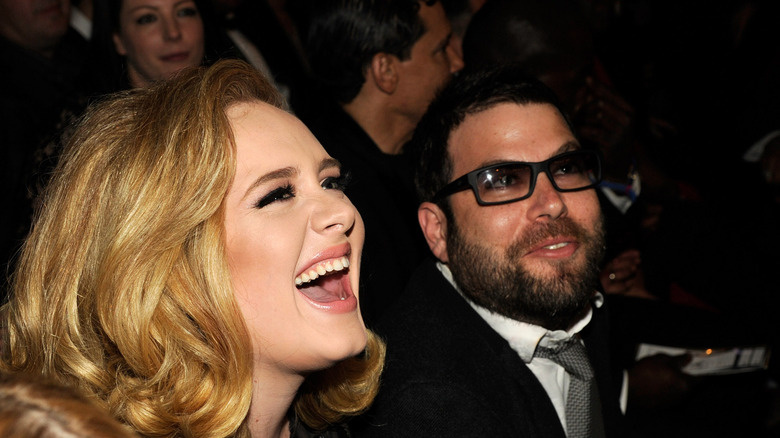 Adele laughing with Simon Konecki