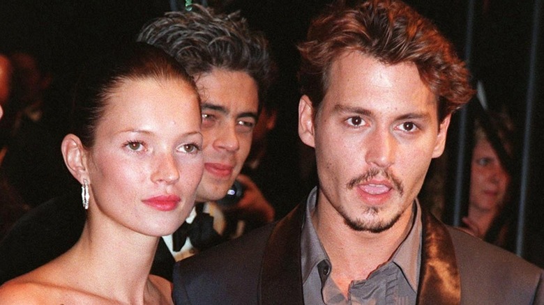 Kate Moss and Johnny Depp at event