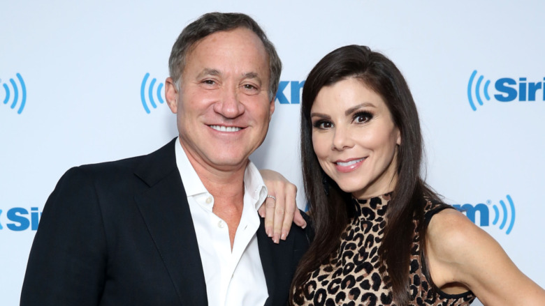 Terry Dubrow and Heather Dubrow smiling 