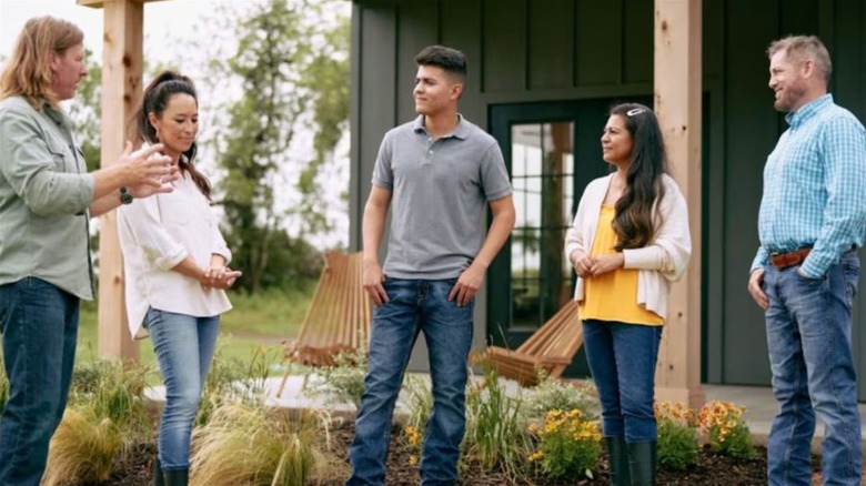 Chip and Joanna Gaines talking with show participants