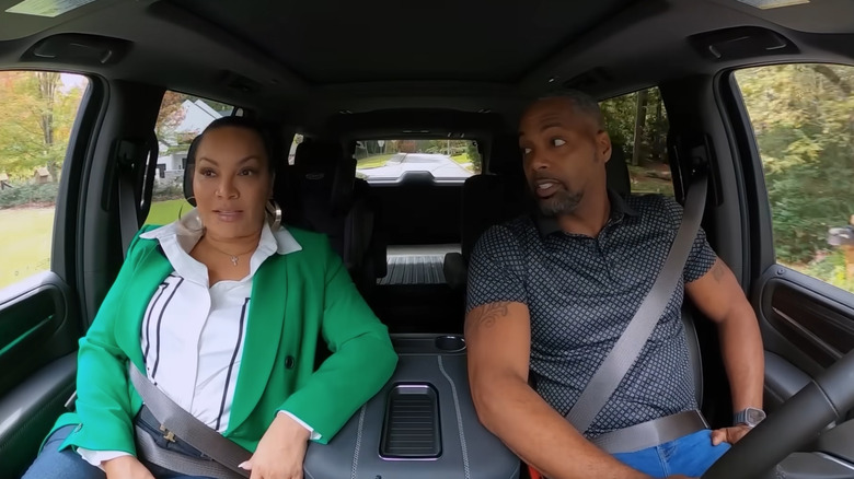 Egypt Sherrod and Mike Jackson filming "Married to Real Estate" inside car