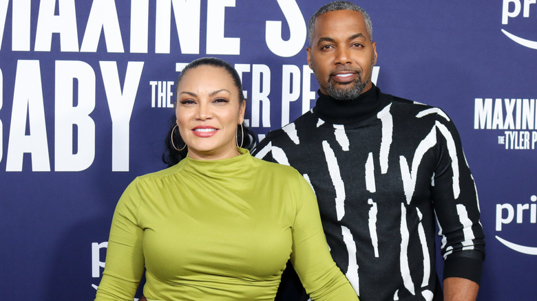 Egypt Sherrod and Mike Jackson pose on red carpet