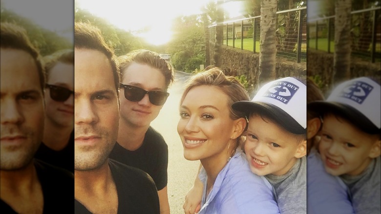 Hilary Duff and family posing