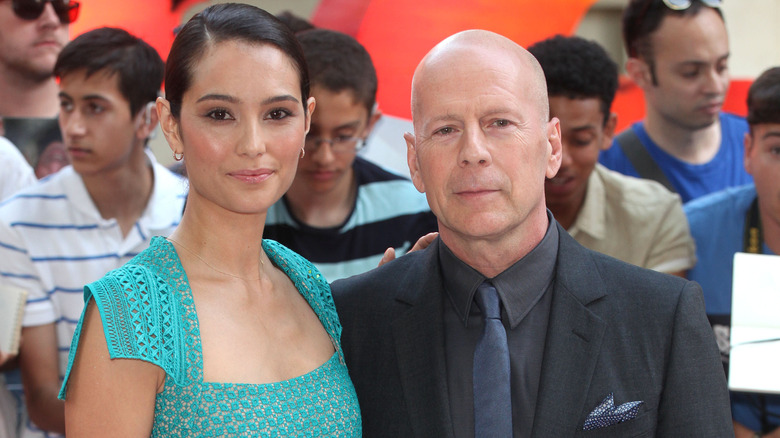 Emma Heming-Willis and Bruce on the red carpet in 2013.