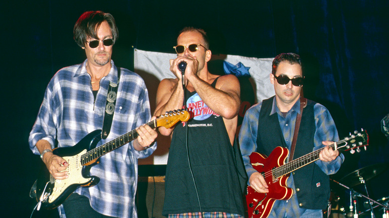 Bruce Willis playing harmonica (center) with his band in 1993.