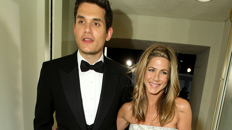 John Mayer and Jennifer Aniston walking together in 2009