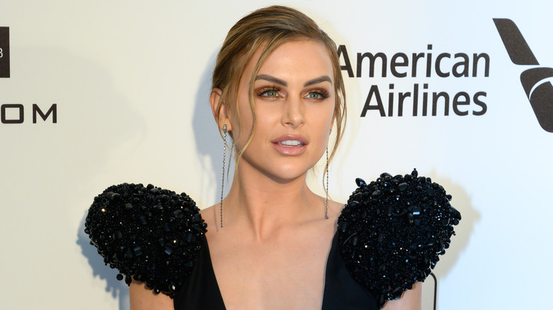 Lala Kent smiles on the red carpet