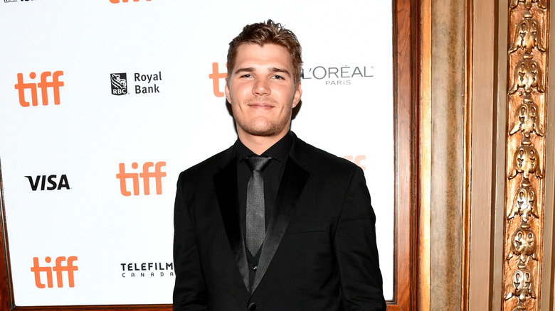 Chris Zylka attending premiere event