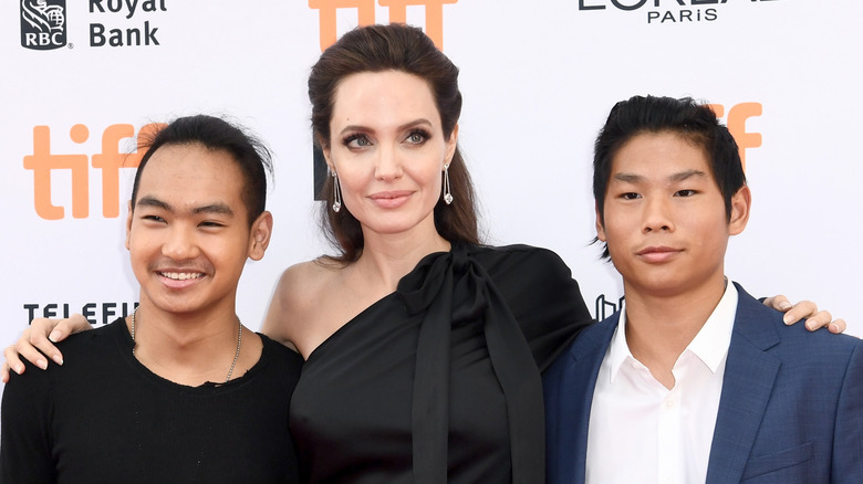 Angelina Jolie, Maddox Jolie-Pitt, and Pax Jolie-Pitt posing together