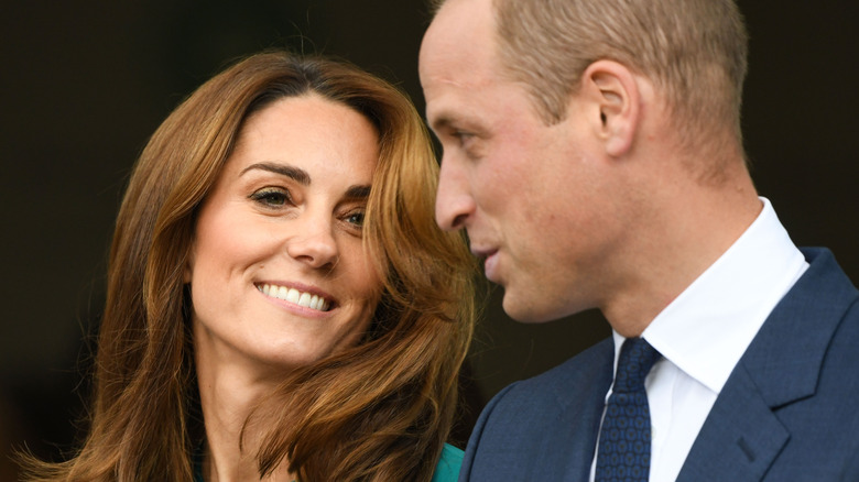 kate middleton and prince william smiling and talking