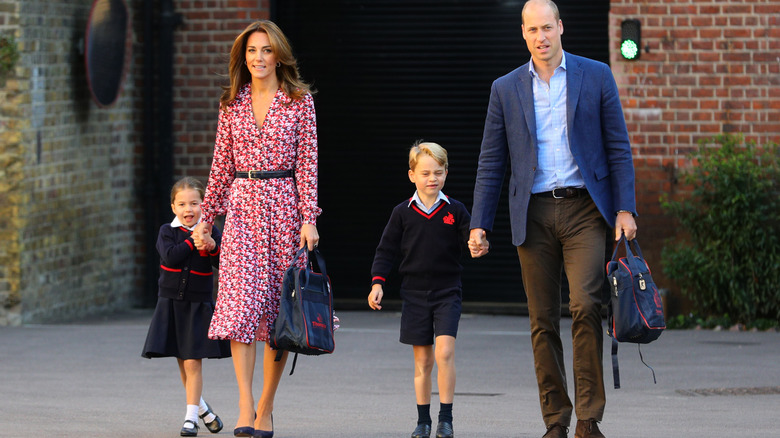 Princess Charlotte and Prince George with the Duke and Duchess of Cambridge on their first day of school