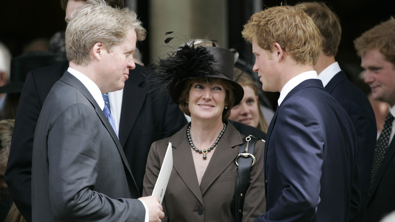 Sarah Spencer talking to Earl Spencer and Prince Harry