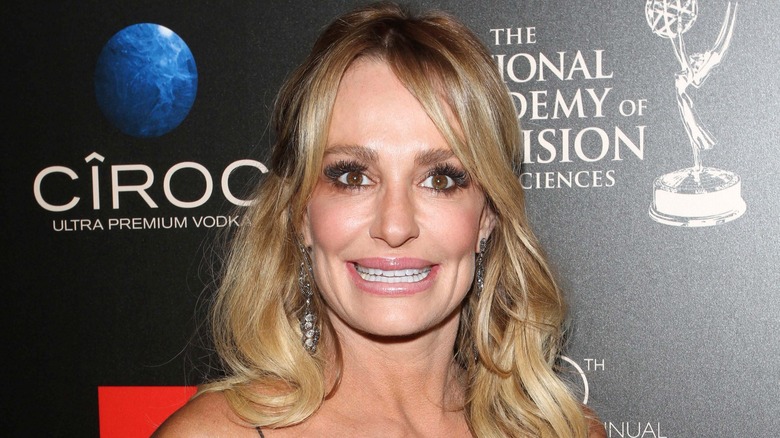 Taylor Armstrong smiling long curly blonde hair
