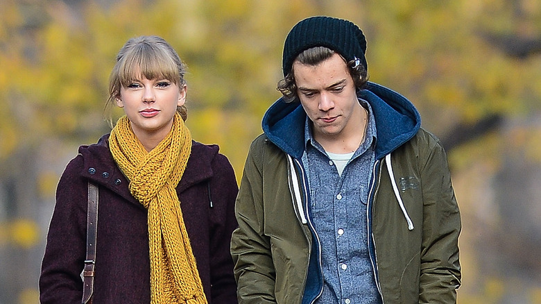 Taylor Swift, Harry Styles outdoors