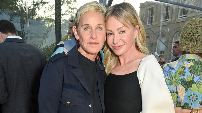 Ellen DeGeneres and Portia de Rossi smiling