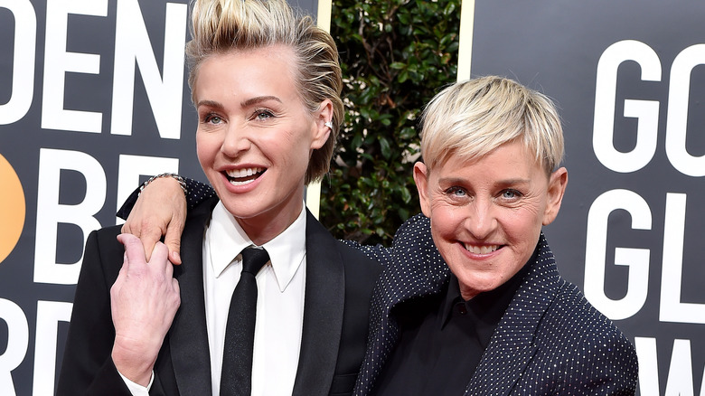 Ellen DeGeneres and Portia de Rossi posing 