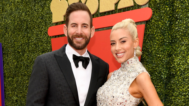 Tarek El Moussa and Heather Rae Young posing together