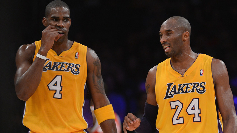 Antawn Jamison and Kobe Bryant, posing on the basketball court