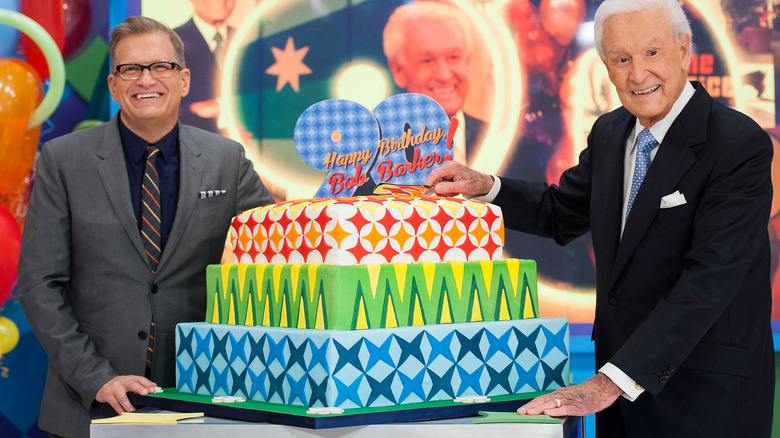 Drew Carey and Bob Barker with a cake