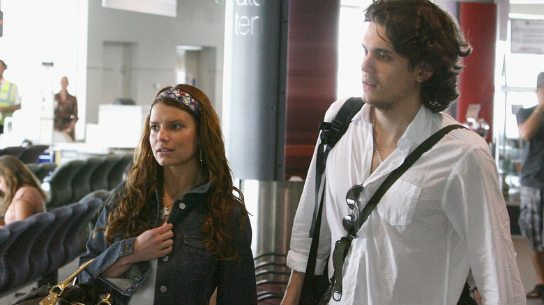 Jessica Simpson, John Mayer, walking together