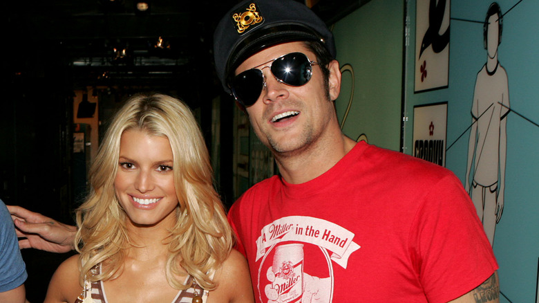 Jessica Simpson, Johnny Knoxville, smiling