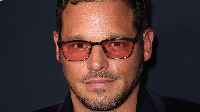 Justin Chambers posing