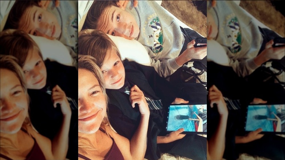 Kate Hudson and her sons posing for a selfie