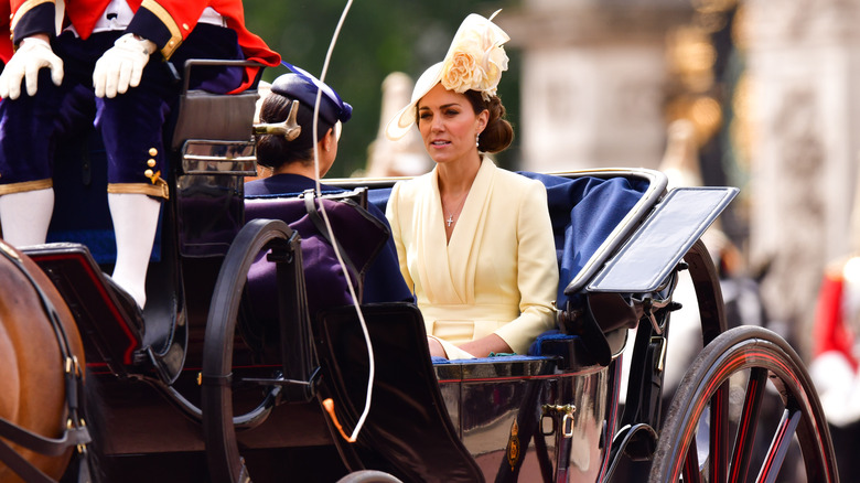 Kate Middleton riding in carriage