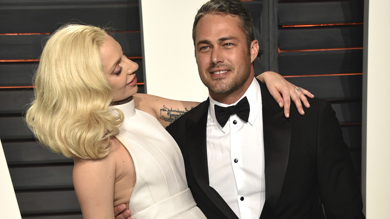 Lady Gaga and Taylor Kinney posing